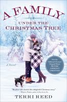A_family_under_the_Christmas_tree
